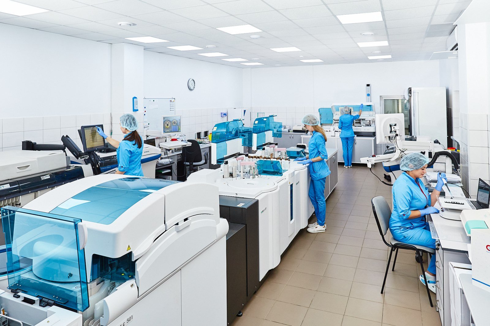 Real-time PCR analysers in a veterinary laboratory. Each fluorescence channel carries one target; a four-chann